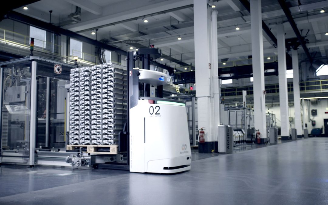 Autonomous guided vehicle operating inside an automated factory, illustrating industrial 5G, edge connectivity and smart manufacturing