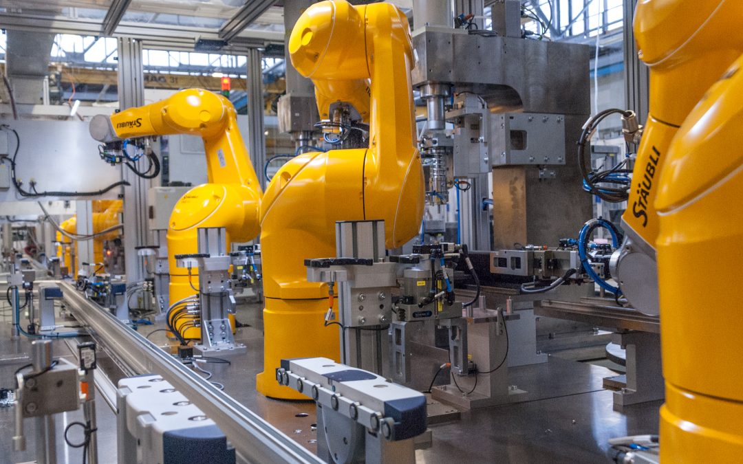 Industrial robots on an automated manufacturing line illustrating smart factory automation and industrial AI