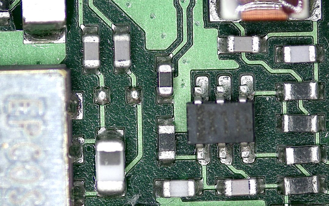 Close-up of an electronics circuit board illustrating 10BASE-T1S single-pair Ethernet and embedded industrial communications