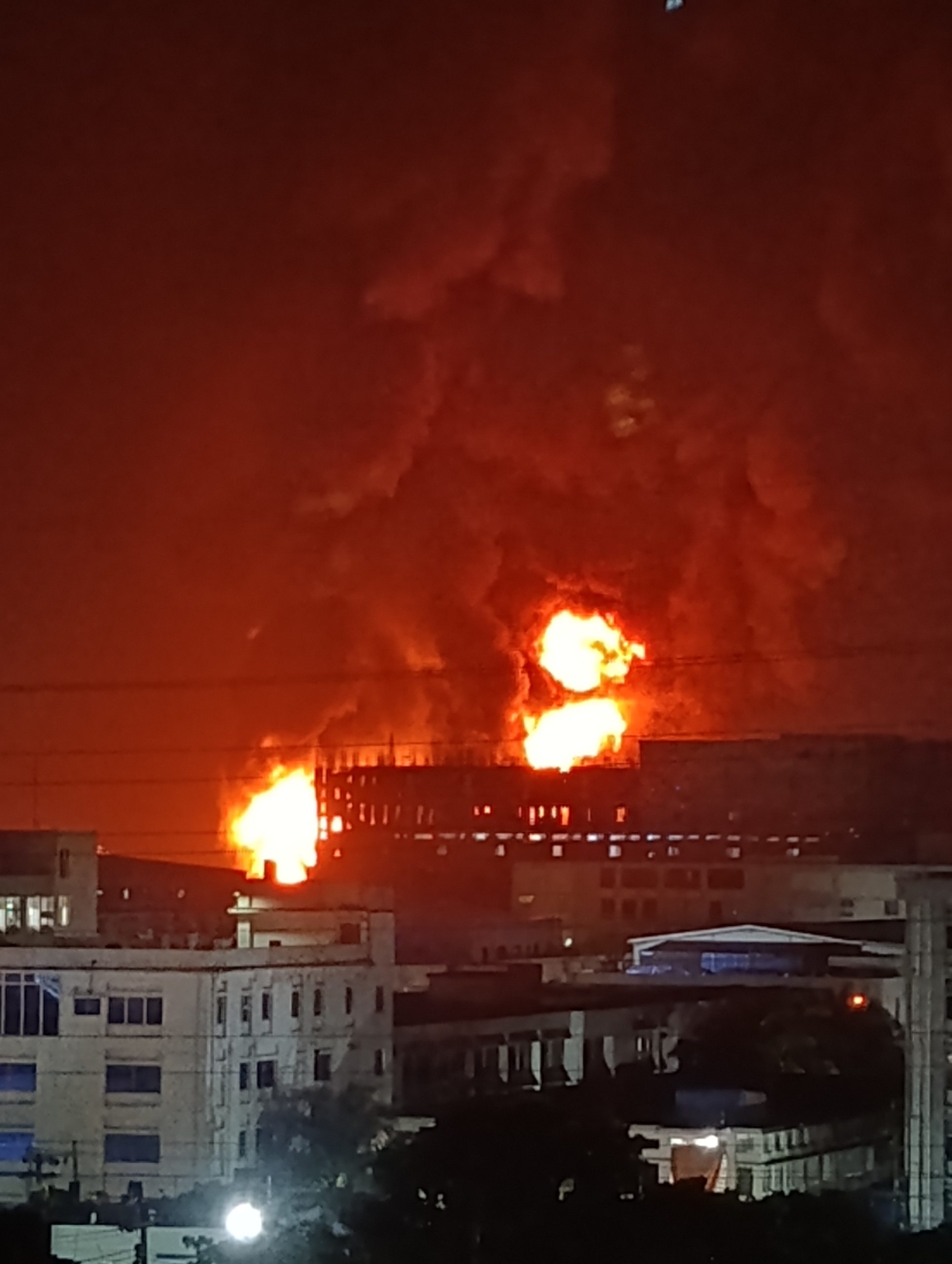 Photograph of 2025 Chittagong factory fire by Arman Sazid; illustrative, not the 2026 Manisa battery-factory incident