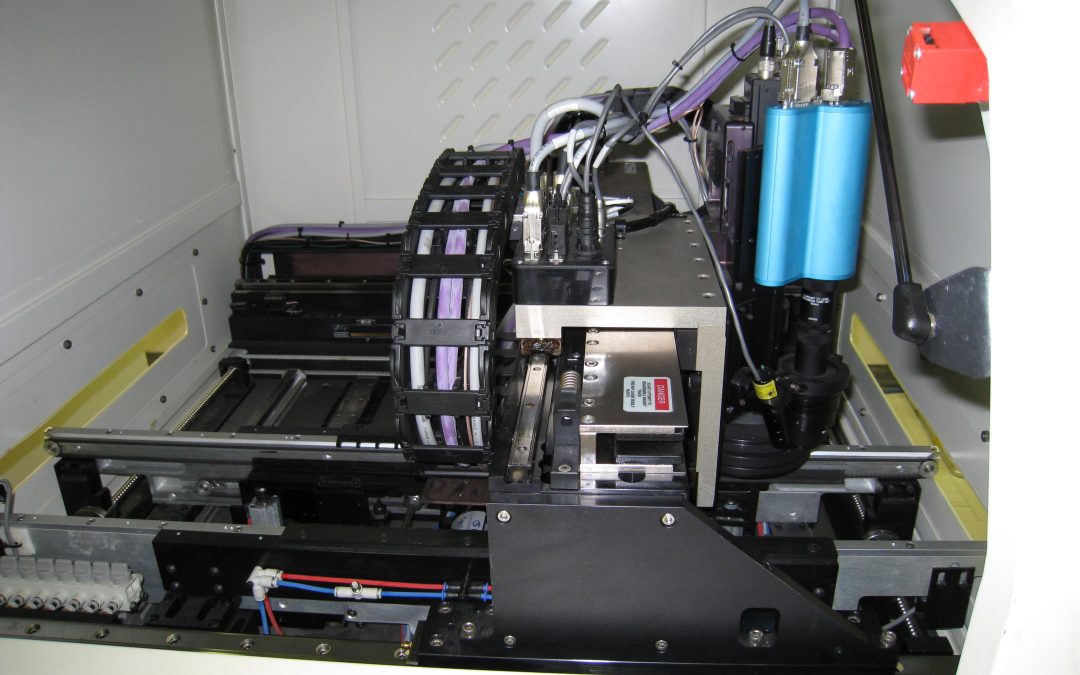 Inspection camera and positioning apparatus inside a solder paste inspection machine, illustrative image by Nelatan (2008)