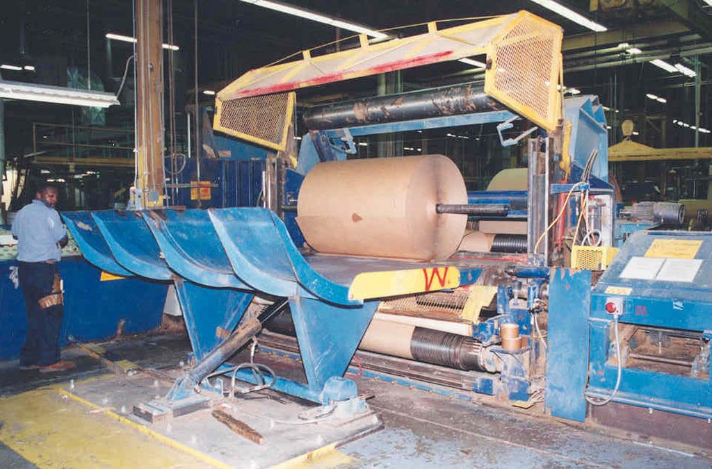 Large industrial paper rolling and cutting machine photographed by NIOSH in 2003; illustrative only, not the October 2026 Bentong incident