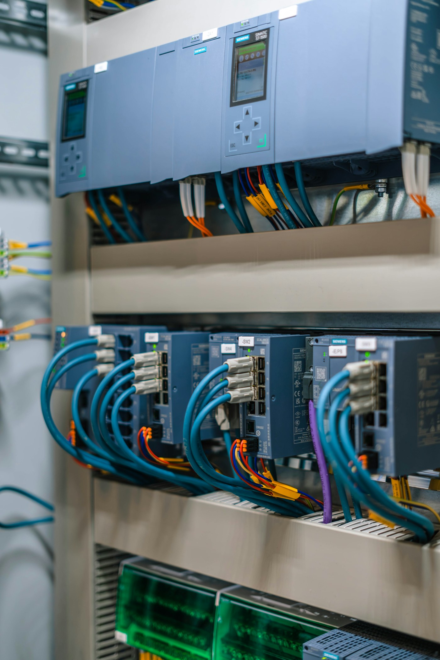 Industrial control cabinet with electronic modules and wiring